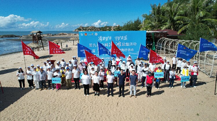 图为第九届全国净滩公益活动(江门分会场)活动大合照2.jpg